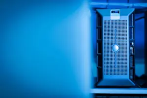 Rows of servers in a data centre with blue lighting